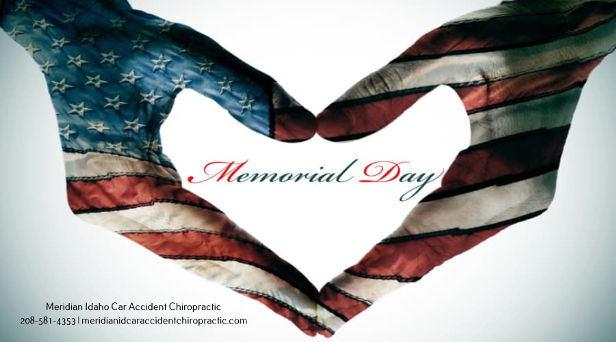 Image of two hands forming heart stating Happy Memorial Day